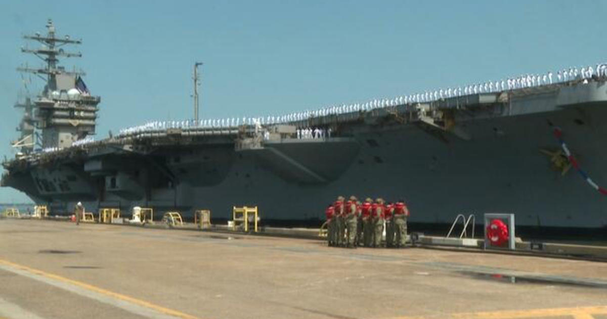 Aircraft carrier returns after nine months defending Red Sea shipping routes