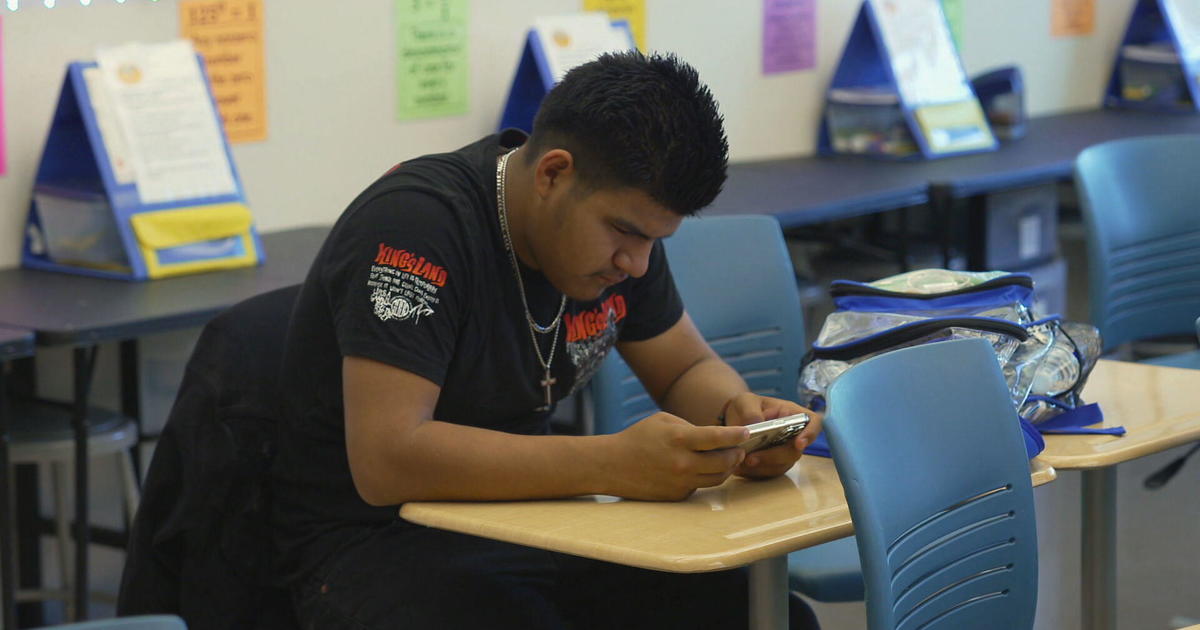 Do smartphones disrupt the school day? Two Virginia schools take different approaches